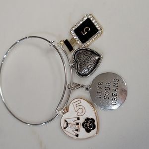 Silver Charm Bangle with 4 medium to large Charms adjustable NWOT